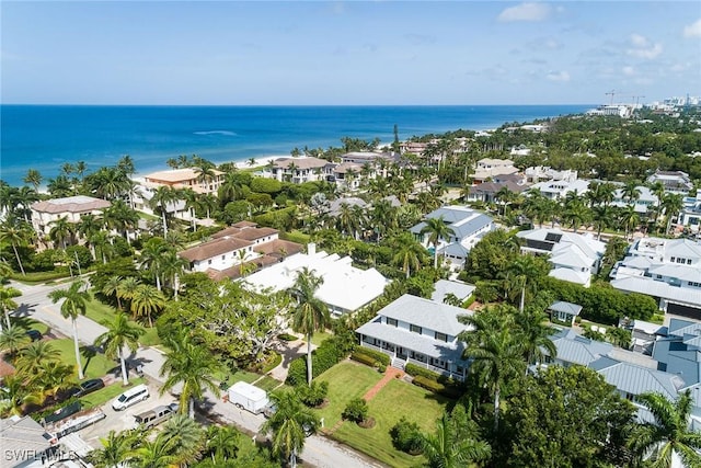 bird's eye view with a residential view and a water view