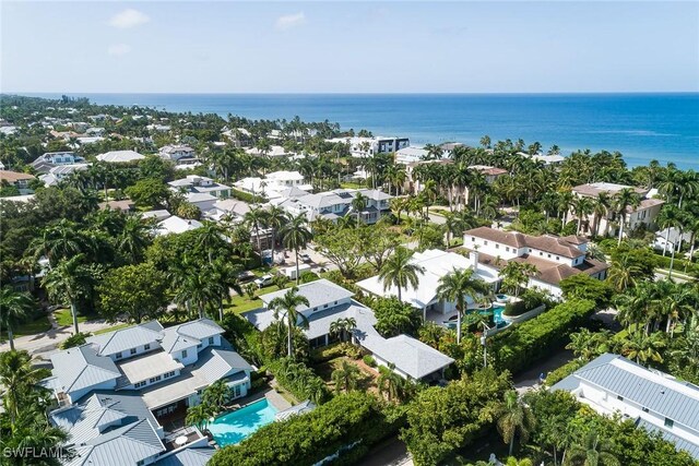 bird's eye view with a residential view and a water view