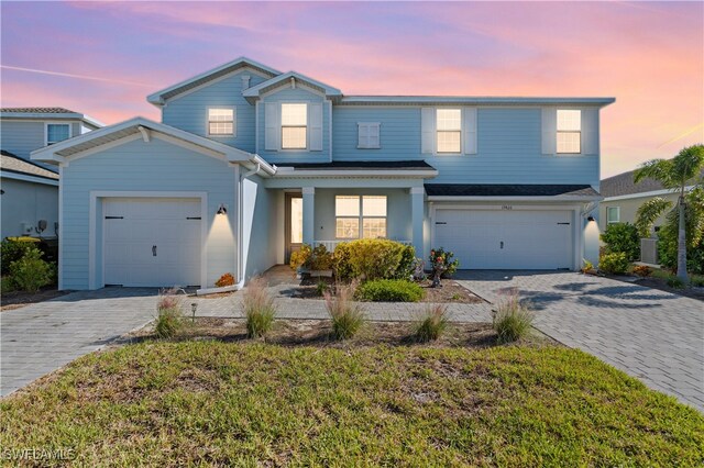 front facade with a garage