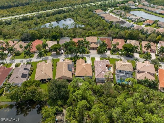 drone / aerial view with a water view