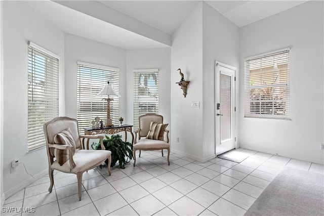 sitting room featuring light tile patterned floors