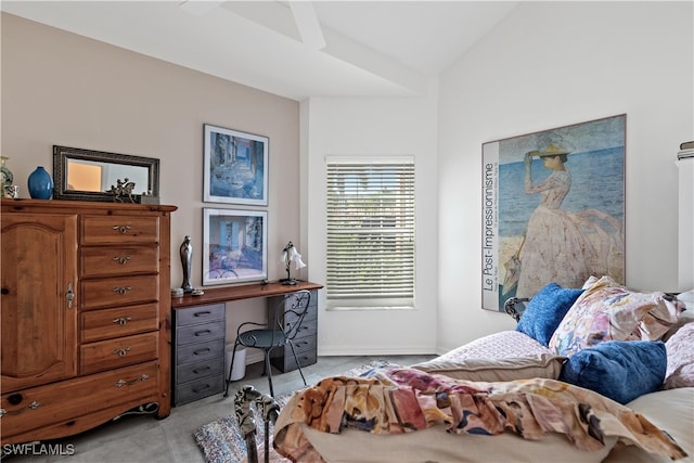 bedroom featuring vaulted ceiling