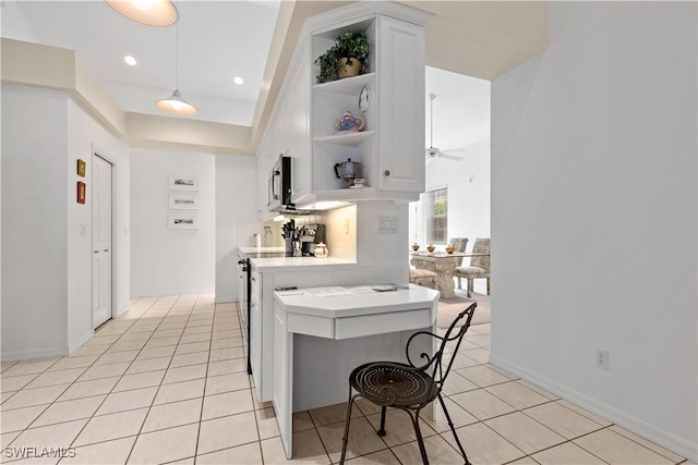 7539 Key Deer Ct, Fort Myers, FL 33966 - kitchen featuring light tile patterned floors, white cabinetry, light countertops, and open shelves