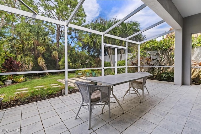 7539 Key Deer Ct, Fort Myers, FL 33966 - unfurnished sunroom with outdoor dining area
