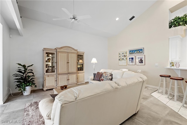 living room with ceiling fan, light tile patterned floors, and high vaulted ceiling