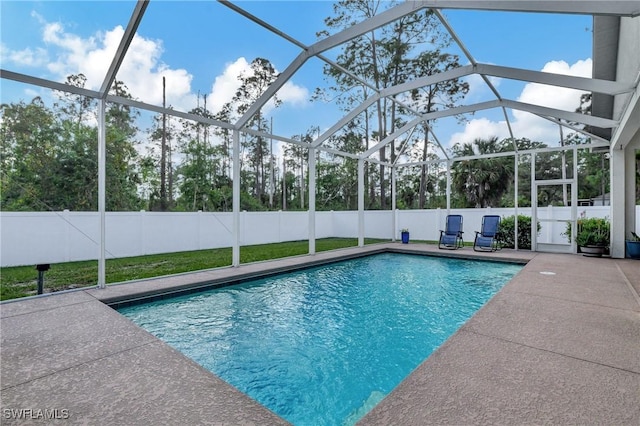 view of pool featuring a patio area and a lanai