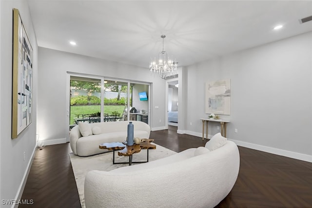 living room with a notable chandelier