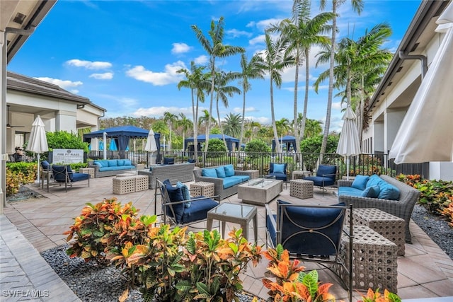 view of patio / terrace with outdoor lounge area and a gazebo