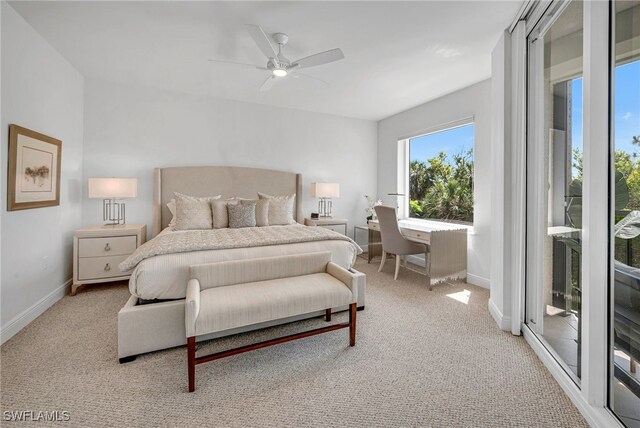 bedroom featuring a ceiling fan, access to outside, light colored carpet, and baseboards