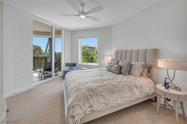 carpeted bedroom with ceiling fan, baseboards, and access to outside