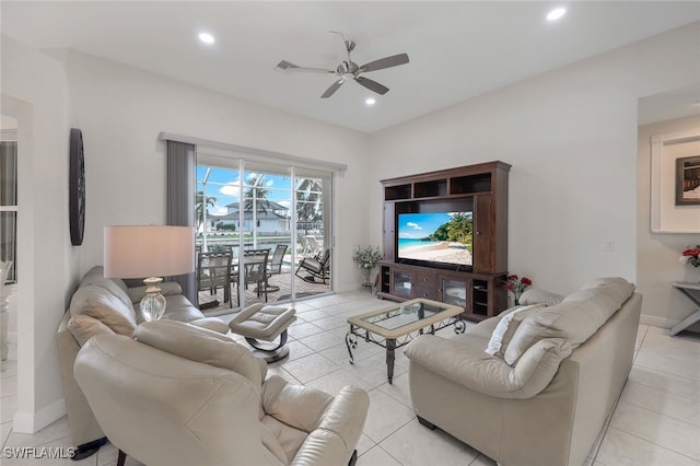 tiled living room with ceiling fan