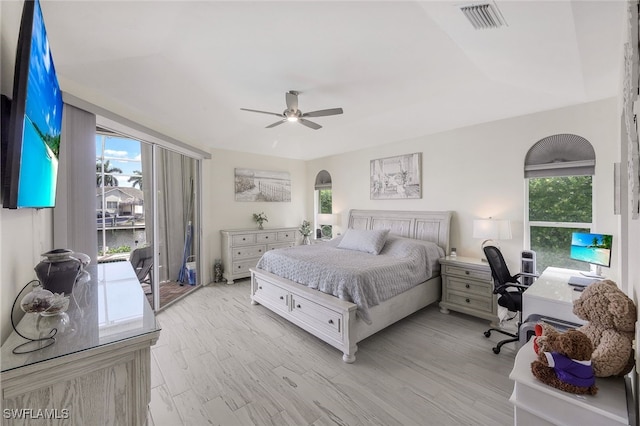 bedroom with light wood-type flooring and ceiling fan