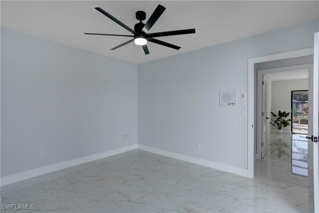 unfurnished room with ceiling fan