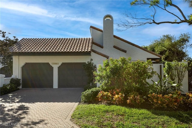 view of front of home with a garage