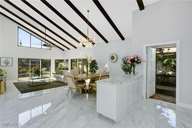 dining room with ceiling fan with notable chandelier, high vaulted ceiling, and beam ceiling