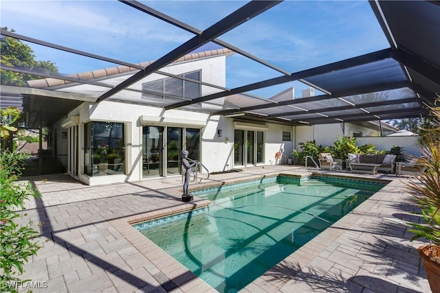 view of pool featuring a patio, a lanai, and outdoor lounge area