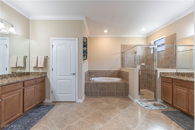 bathroom featuring vanity, crown molding, and separate shower and tub