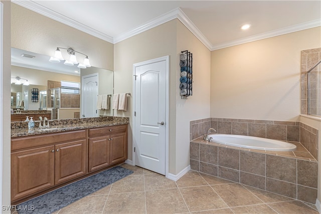 bathroom featuring vanity, tile patterned flooring, ornamental molding, and independent shower and bath