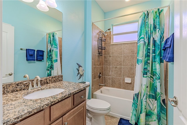 full bathroom with toilet, vanity, tile patterned flooring, and shower / bath combo with shower curtain