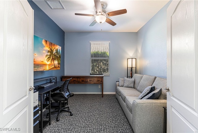 office space featuring carpet floors and ceiling fan