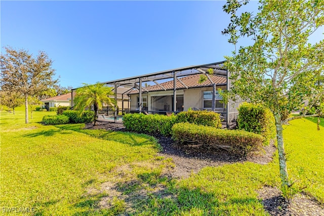 view of yard featuring a lanai