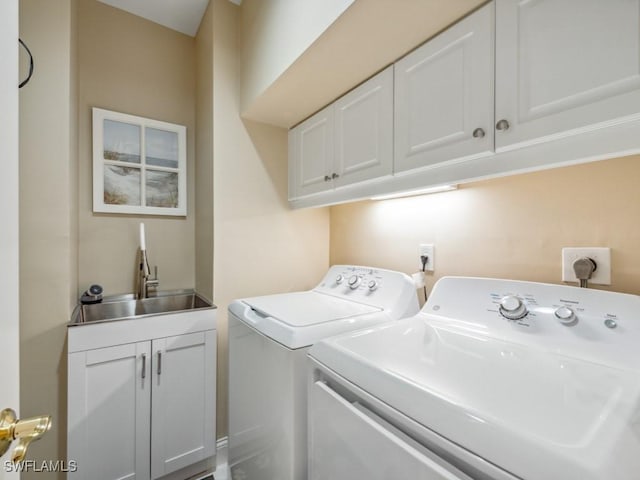 241 Colonade Cir, Naples, FL 34103 - washroom featuring separate washer and dryer and cabinet space