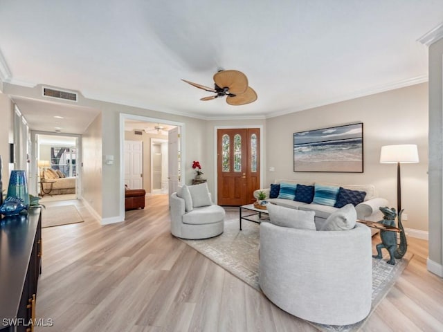 241 Colonade Cir, Naples, FL 34103 - living room with ceiling fan, crown molding, light wood-style flooring, and baseboards