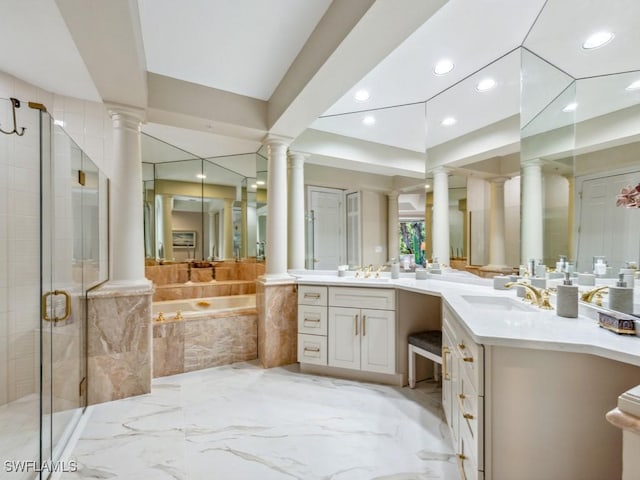 241 Colonade Cir, Naples, FL 34103 - full bathroom featuring ornate columns, a bath, vanity, a shower stall, and recessed lighting