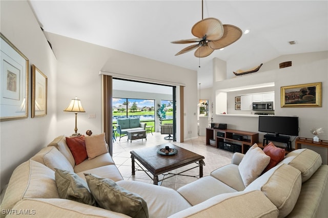 living room with ceiling fan and lofted ceiling