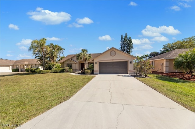 view of front facade with a front yard and a garage