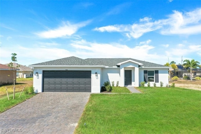 ranch-style house with a garage and a front lawn