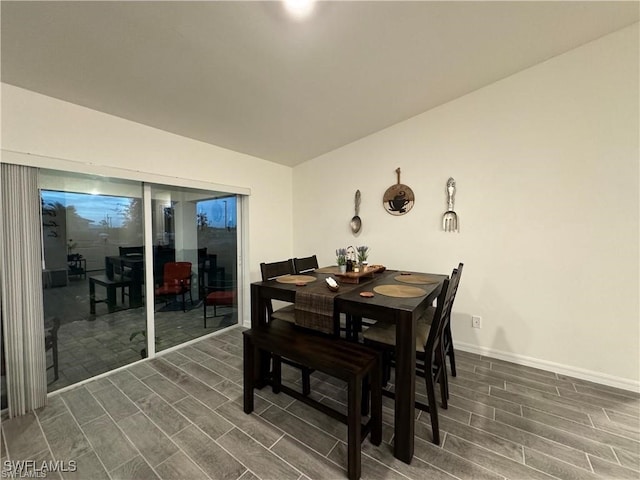 dining room featuring dark hardwood / wood-style flooring