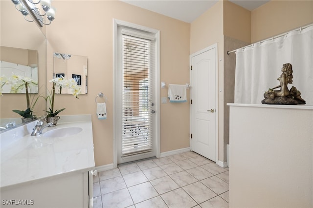 bathroom featuring vanity and tile patterned flooring