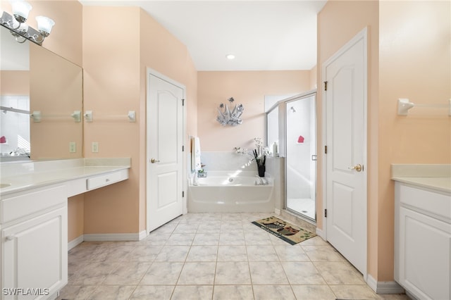 bathroom with vanity, tile patterned flooring, and separate shower and tub