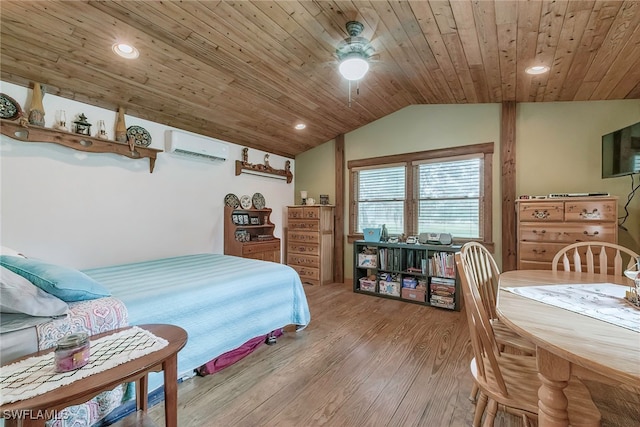 bedroom featuring lofted ceiling, light hardwood / wood-style flooring, a wall unit AC, wood ceiling, and ceiling fan