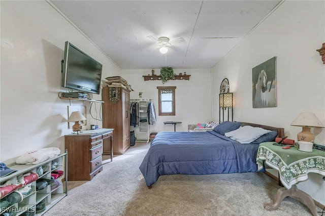 bedroom featuring ceiling fan and carpet flooring