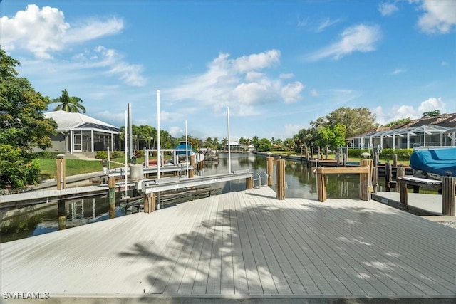 dock area with a water view