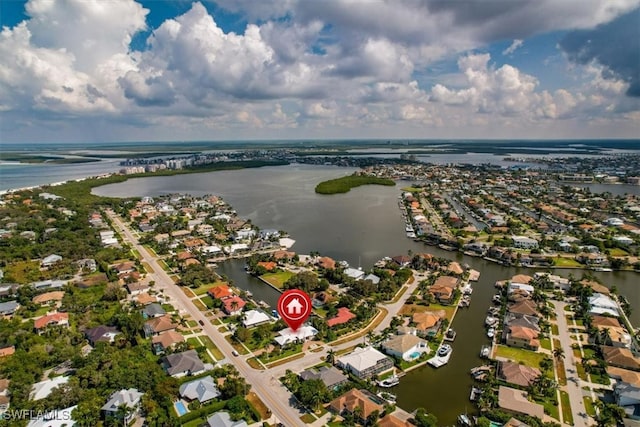 bird's eye view with a water view