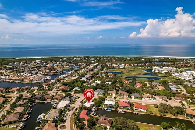 bird's eye view with a water view