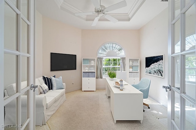 office with a raised ceiling, light carpet, and french doors