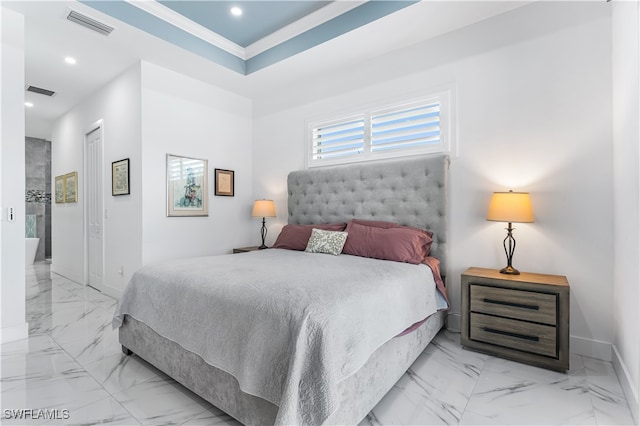 bedroom featuring crown molding and a closet