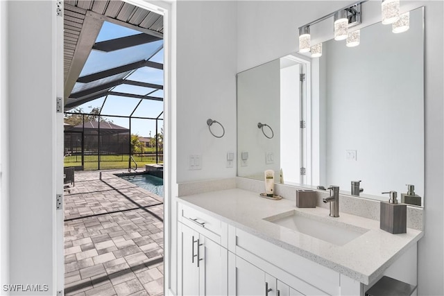 854 SW 15th Ave, Cape Coral, FL 33991 - bathroom with vanity and brick patterned floor