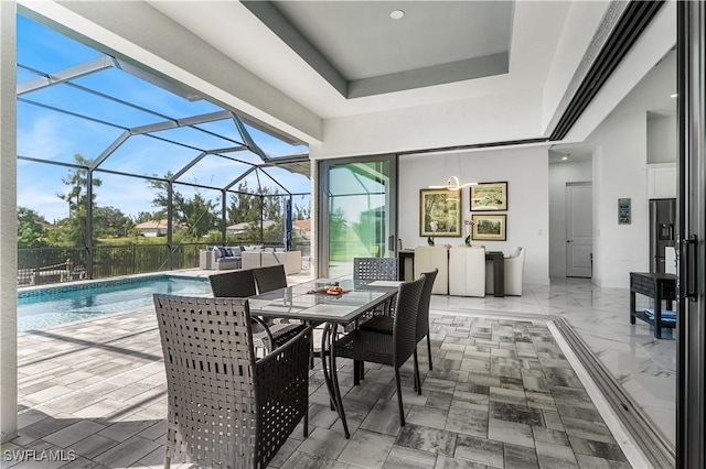 854 SW 15th Ave, Cape Coral, FL 33991 - view of patio / terrace with glass enclosure, outdoor lounge area, and a fenced in pool