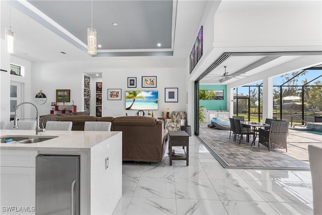 854 SW 15th Ave, Cape Coral, FL 33991 - interior space with recessed lighting, a ceiling fan, a sink, decorative light fixtures, and open floor plan