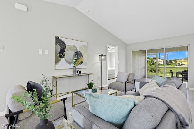 living room with lofted ceiling