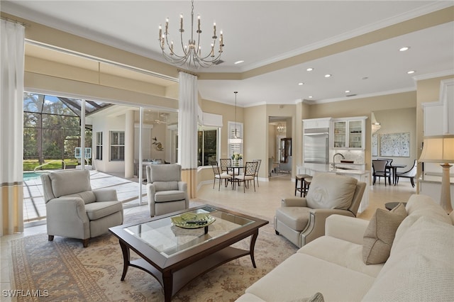 living room featuring ornamental molding and sink