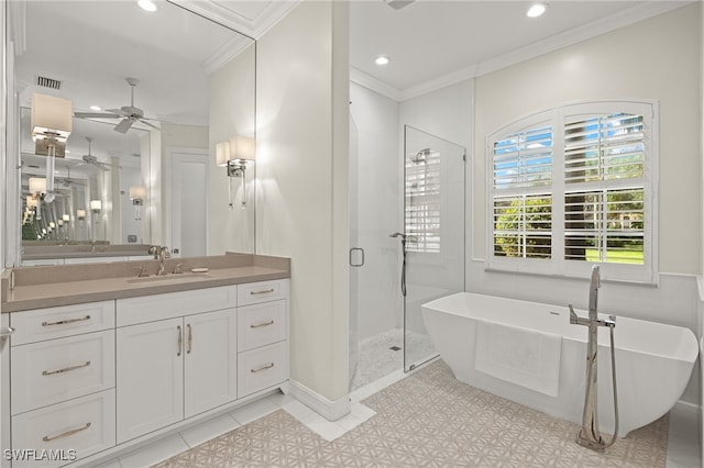 bathroom featuring plus walk in shower, tile patterned flooring, ornamental molding, vanity, and ceiling fan