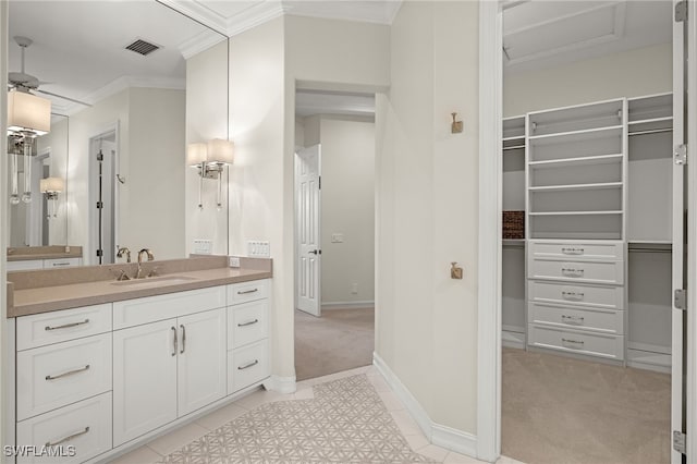 bathroom featuring vanity and crown molding