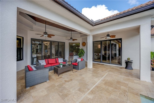 view of patio / terrace featuring ceiling fan and an outdoor hangout area