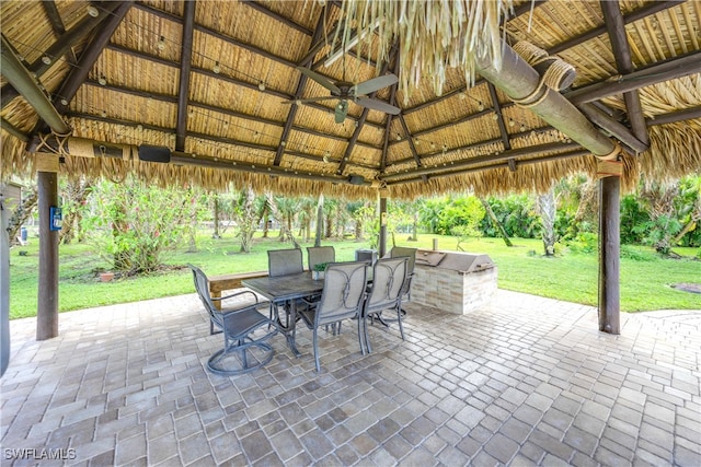 view of patio / terrace featuring area for grilling, a gazebo, and ceiling fan